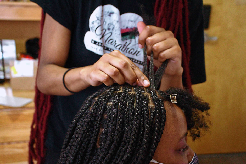 Akunna Ekeh getting her hair done